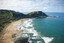 Looking down Makarori beach to headland & hill walk