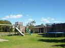 Playground with trampoline