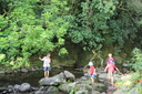 Playing in the cold river.