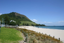 The beach with Mount Maunganui in the background