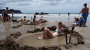 Chilling in the home made pool - Hot Water Beach