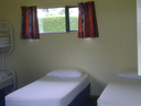 Cabin B has two single beds and set of bunks  - sleeps 4. Linen/bedding packs available for hire at $5 per person